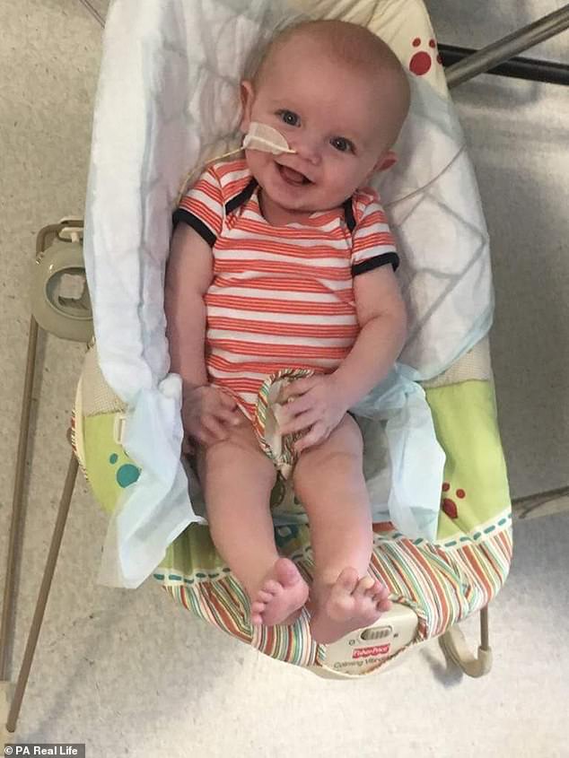 Milo is pictured in the isolation unit, where he spent three months before the transplant 