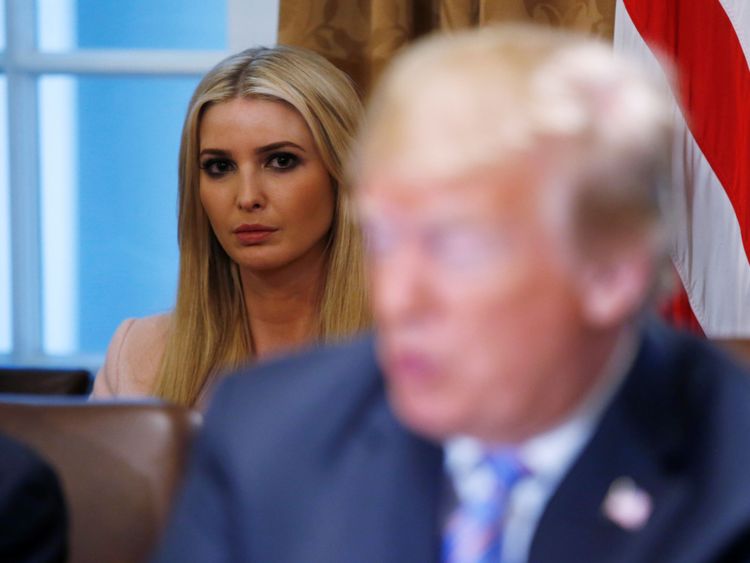 Ivanka Trump listens to her father Donald