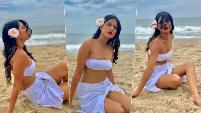 Nia Sharma Looks Bewitching in Bandeau Bra, Button-Down Skirt, White Flower in Hair and Bold Red Lips! Watch Her Sexy Slow-Mo Dance Video and Pics From Pondicherry