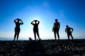 Members of then Bray Beach Bathers group prepare for their daily swim. Photo: Gerry Mooney