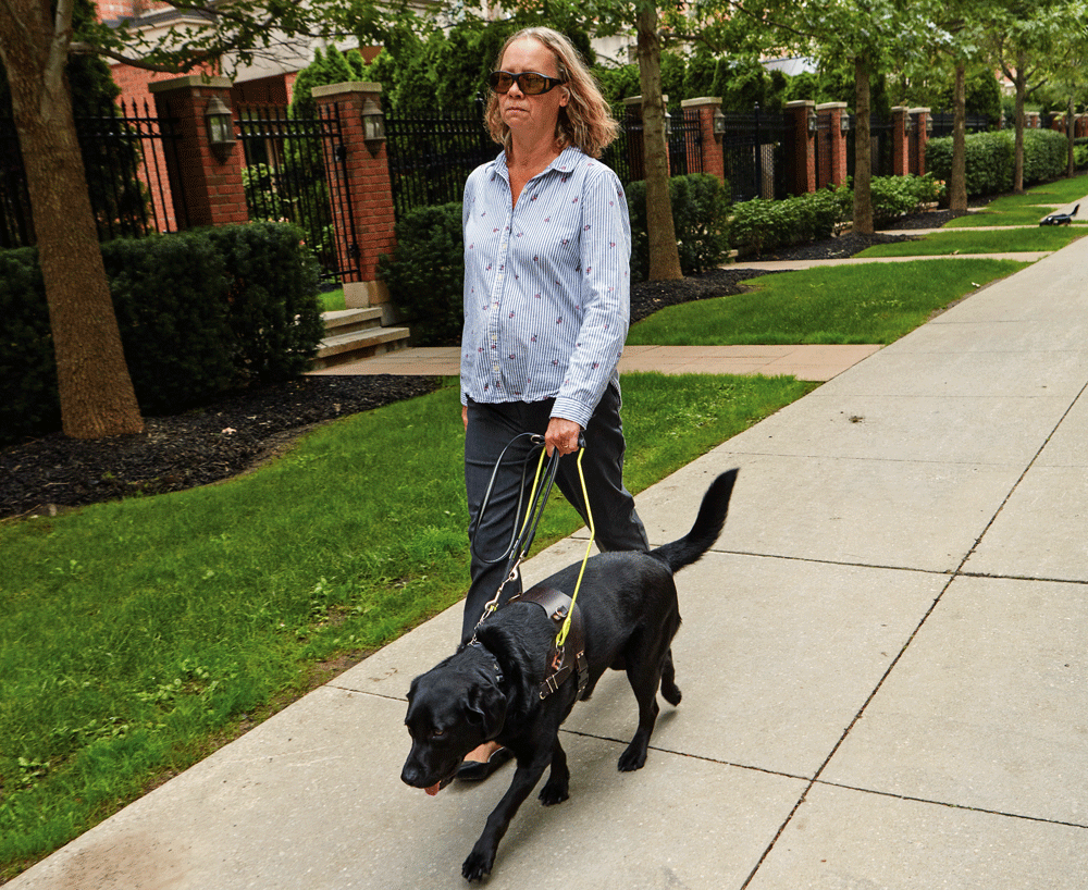 Cindy Shone with her guide dog Barney. “I can go out on the streets with this dog, just as if I could see myself,” Shone says.